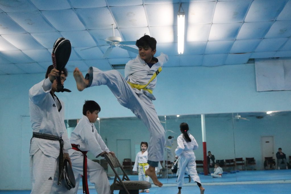 IMG_4835 Student performing jumping high kick
